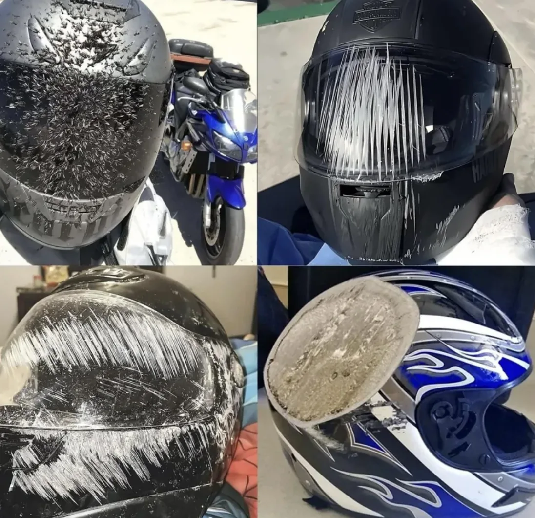 Four damaged motorcycle helmets showing deep scrapes after crashes