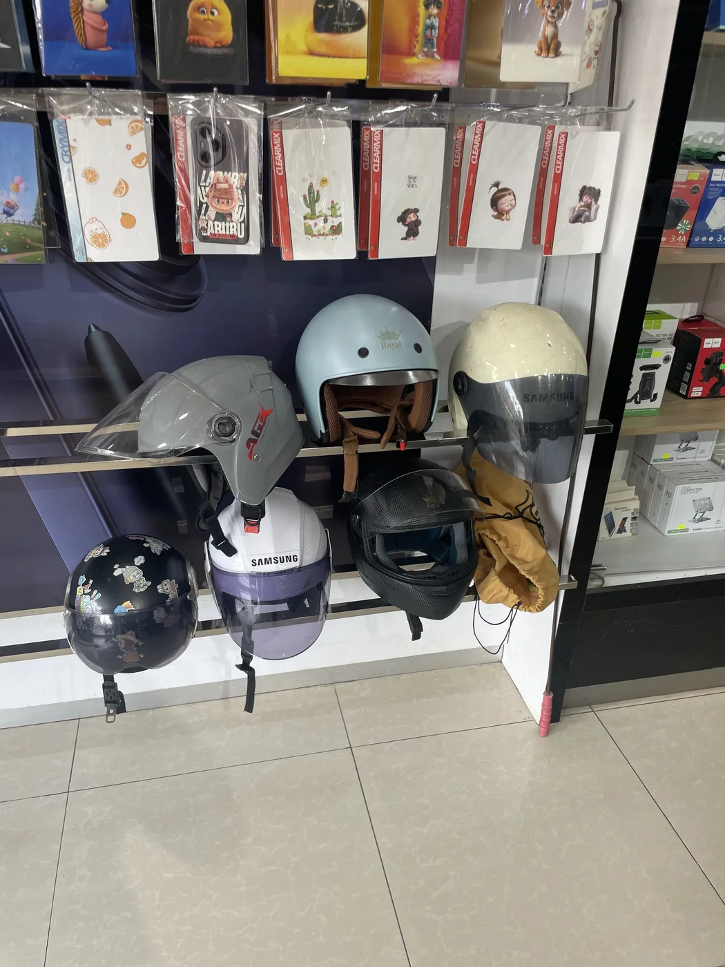 Retail display of different helmet styles and straps