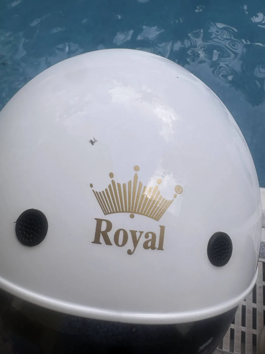 White Royal helmet showing ventilation openings